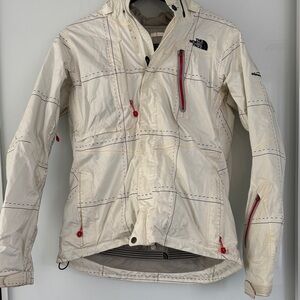The North Face Cream Hooded Shell Jacket with Red Zipper Accents